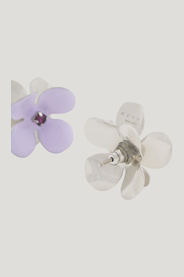 Purple enamel daisy stud earrings — model side