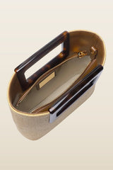 Eva In Raffia And Tortoiseshell — model back