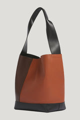 Light brown, dark brown and black leather Pod 2.0 bag — model front