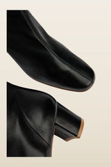 Sofia Black Leather Ankle Boot — model back