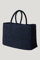 The Charlotte Raffia Bag Small — model front