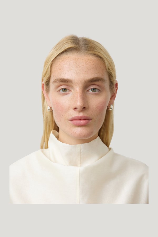 The Simone Earrings — model side