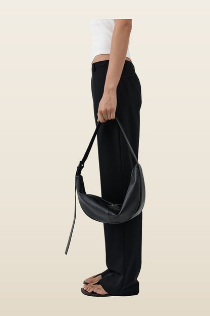 Adjustable Slim Crescent Bag — model back