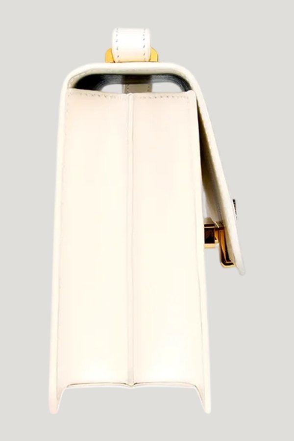 Alex In Cream Leather — model side
