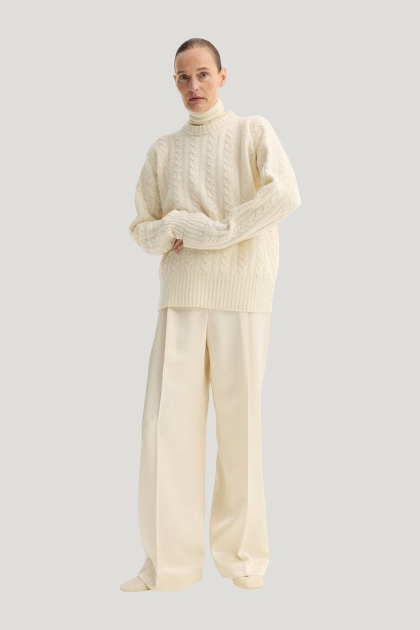 Cable knit jumper — model front