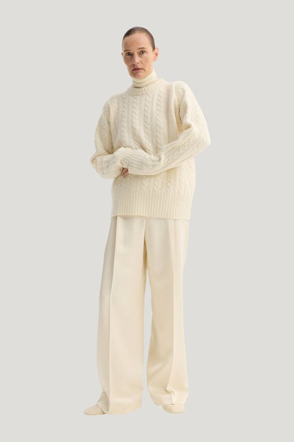 Cable knit jumper — model front