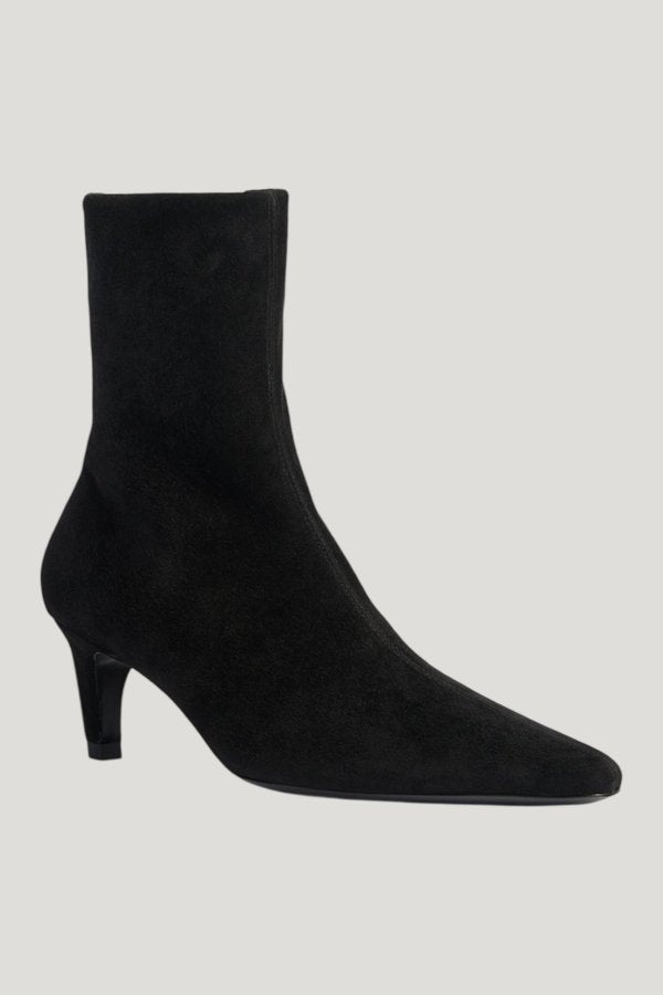 Cave Ankle Boot in Black Stretch Suede Leather — model front