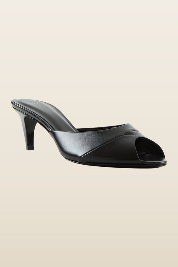 Cave Mule in Black Creased Leather — model back