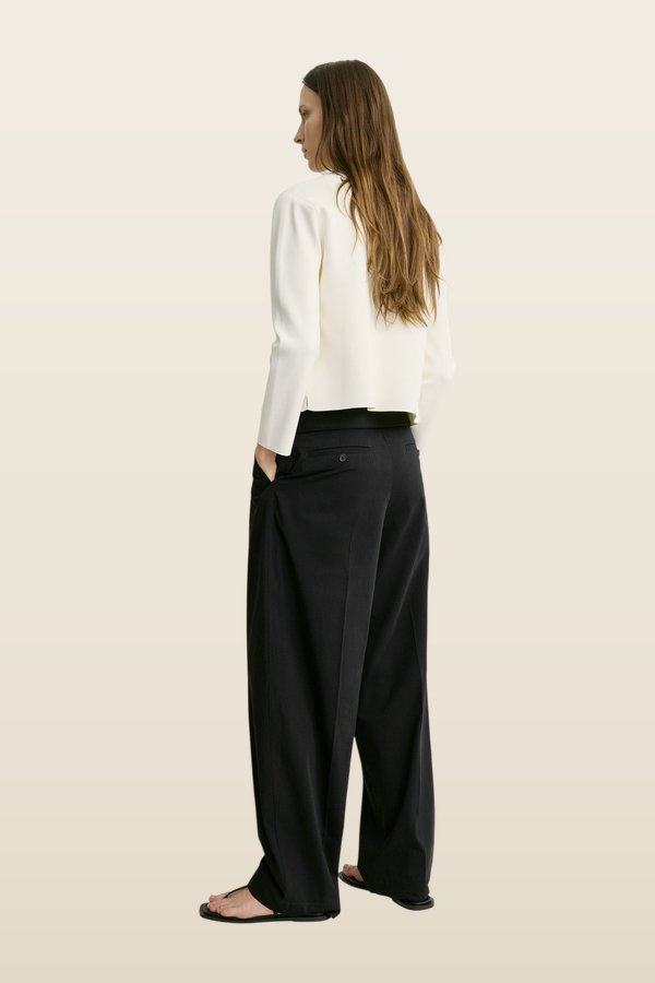 Classic compact knit cardigan — model back