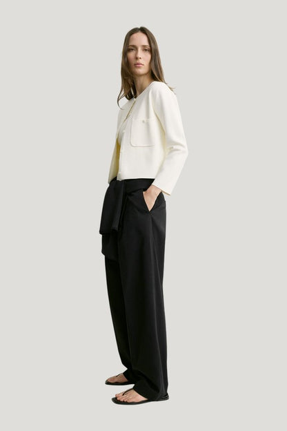 Classic compact knit cardigan — model side
