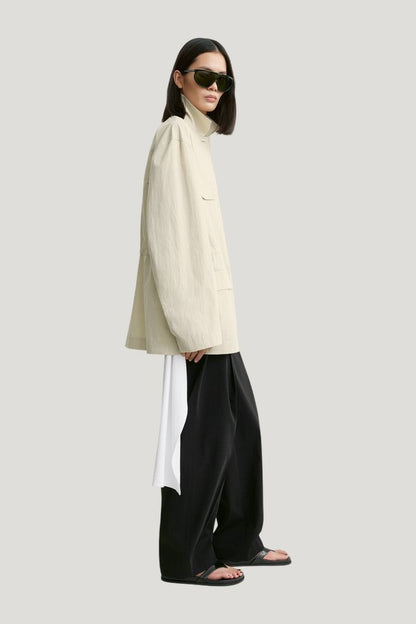 Collared drawstring jacket — model side