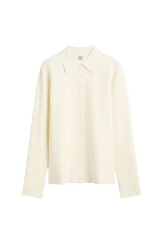 Compact knit buttoned top — packshot