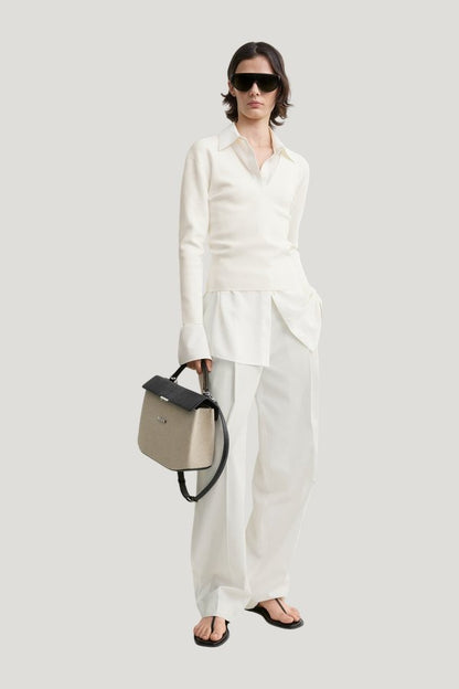 Compact knit v-neck — model front