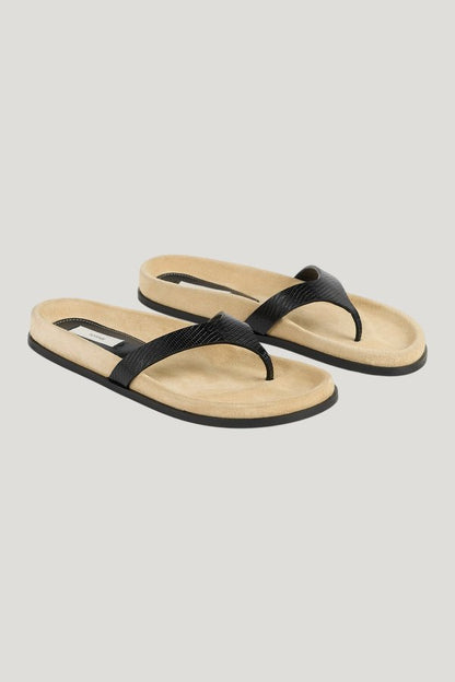 Contoured lizard-embossed flip flops — model side
