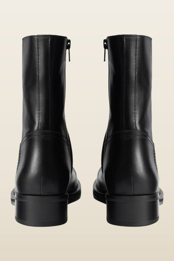 Daryl Ankle Boot in Black Leather — model back
