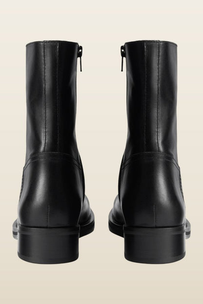 Daryl Ankle Boot in Black Leather — model back
