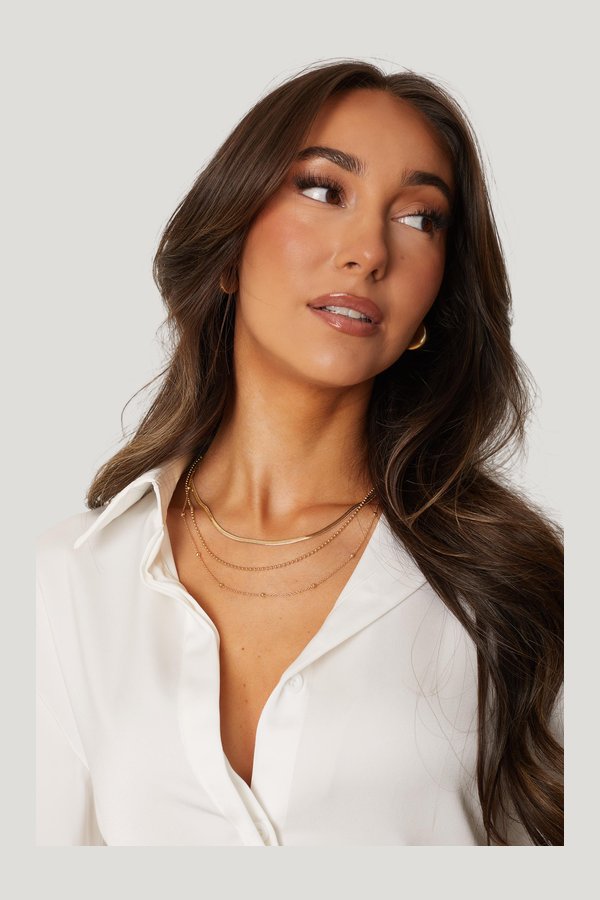 Delia Gold Layered Necklace — model side
