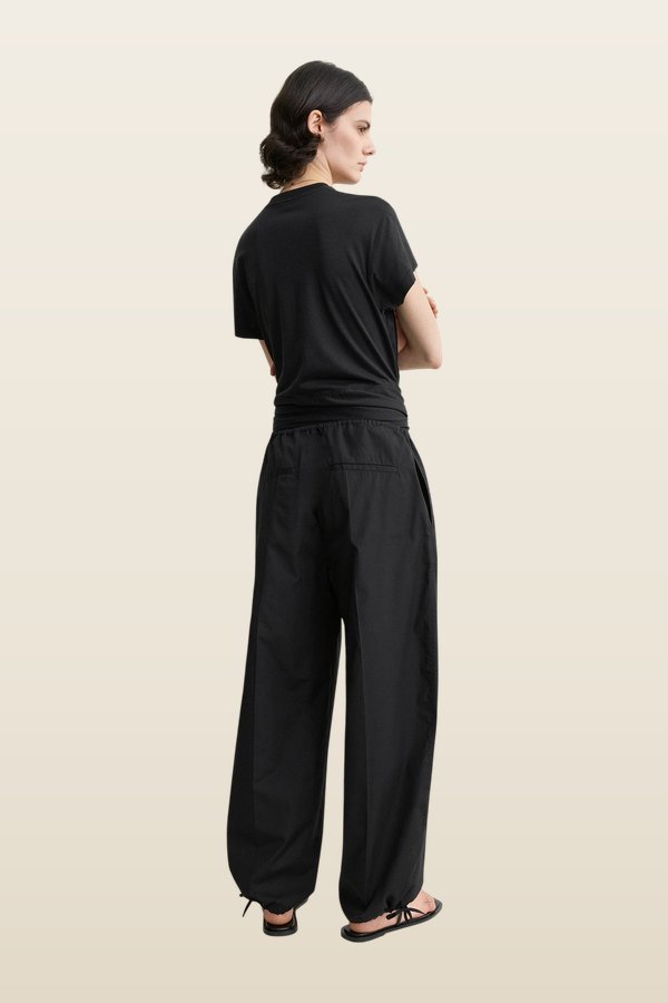 Drawstring cotton trousers — model back
