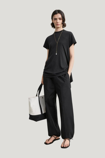 Drawstring cotton trousers — model front