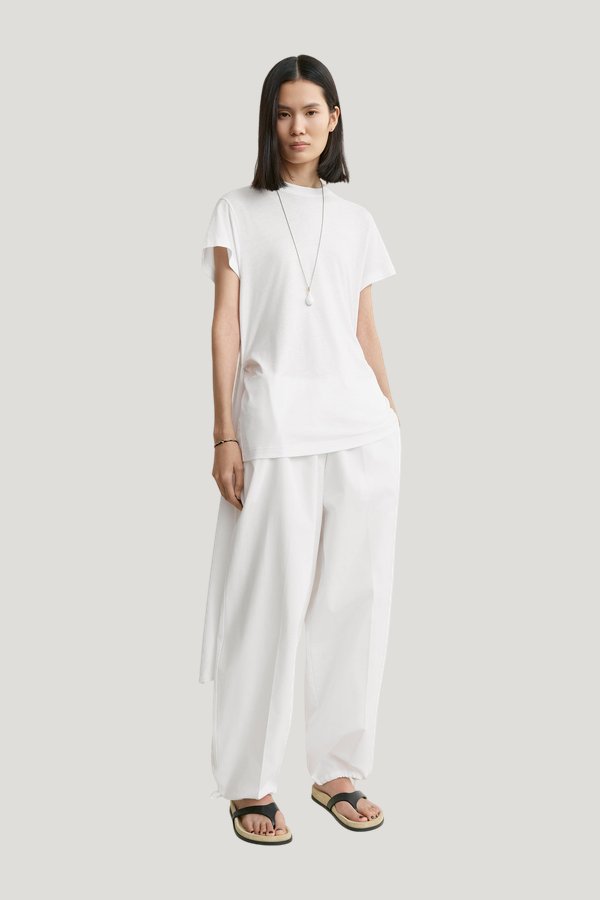 Drawstring cotton trousers — model front