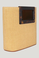 Eva In Raffia And Tortoiseshell — model front