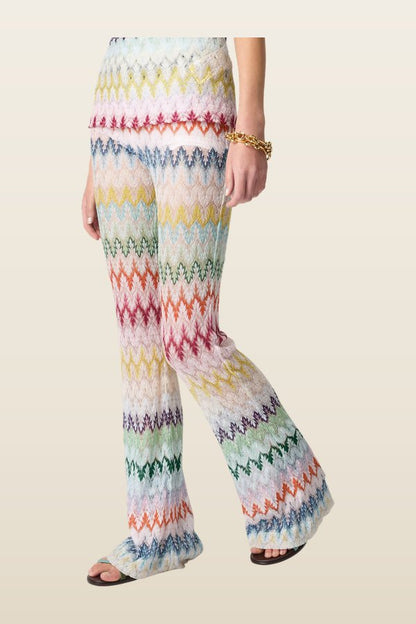 Flare trousers in viscose-blend lamé with zig zag motif — model back