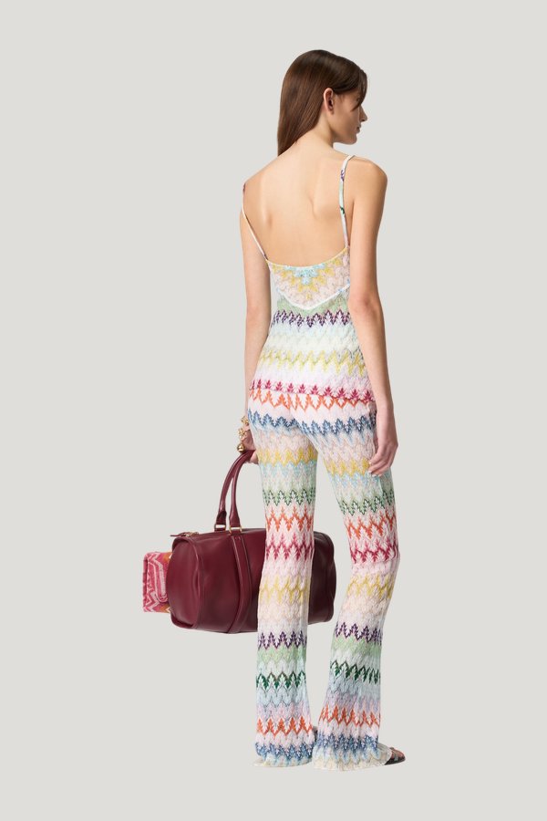 Flare trousers in viscose-blend lamé with zig zag motif — model side