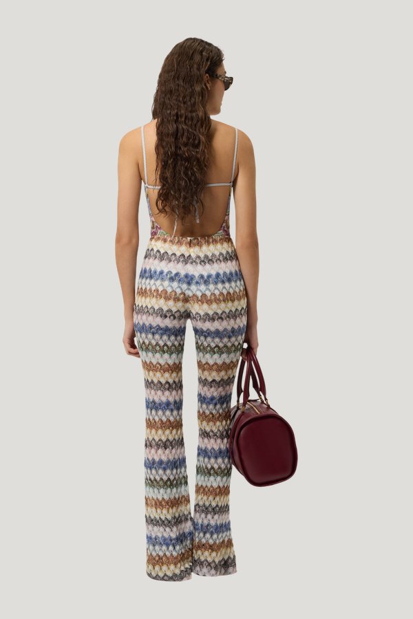 Flare viscose lamé trousers with lace motif — model side