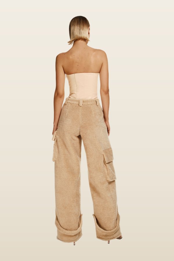 Fluffy pants in Latte — model back