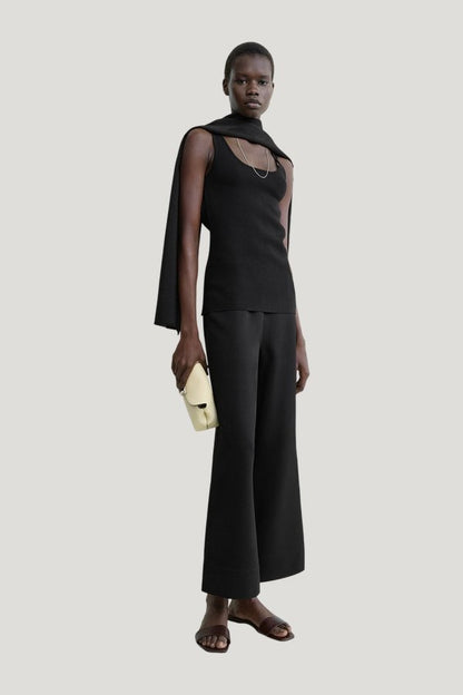 Fluid satin trousers — model side