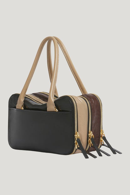 Black, brown and taupe leather small Boxyne bag — model side