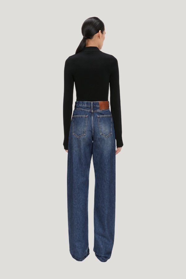 High Waist Jean In Mid Blue Wash — model side