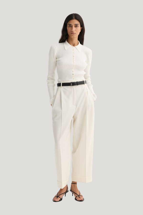 High-waist turn-up trousers — model front