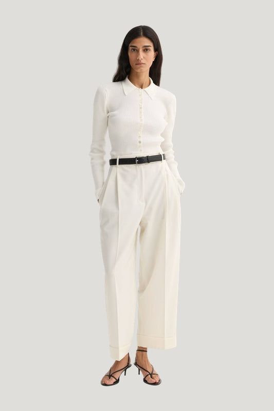 High-waist turn-up trousers — model front