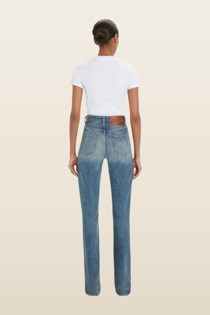 Julia Stretch Jean In Worn Blue Wash — model back