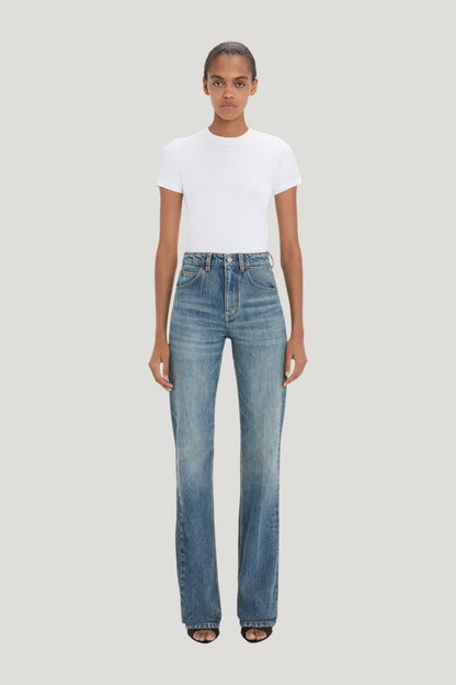 Julia Stretch Jean In Worn Blue Wash — model front
