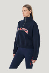 Legacy Quarter Zip Sweat — model side