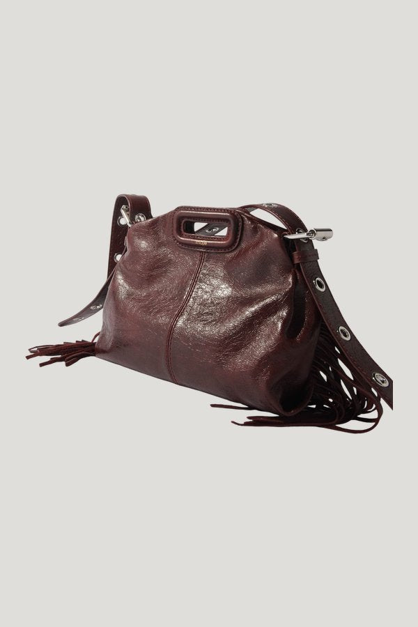 Miss M mini cracked leather bag — model side