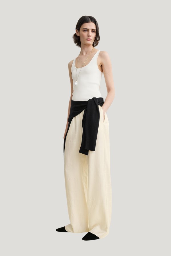 Monogram silk pj bottoms — model front