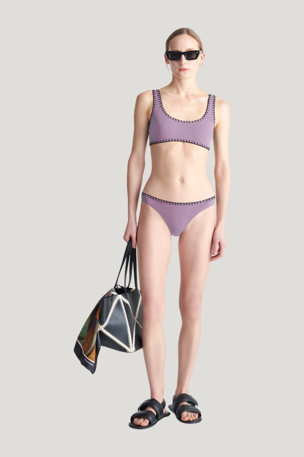 Merve - Recycled nylon bikini bottoms — model front