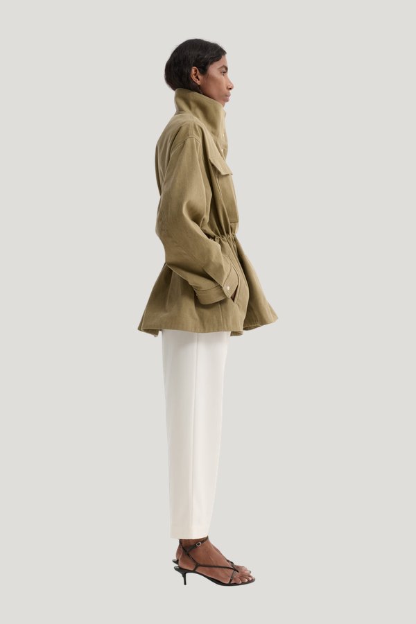 Sculptural safari jacket — model side
