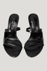 Serena Black Semi Patent Leather Slip-On Mule — model side