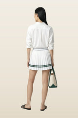 Serif Logo Pleated Skirt - White/Forest — model back
