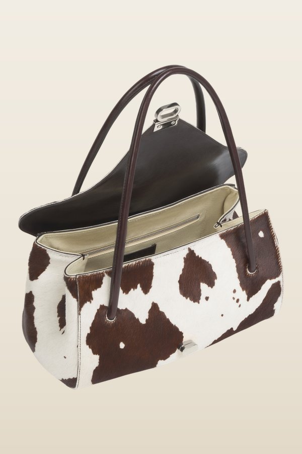 White and brown cow-print ponyhair E/W shoulder bag — model back