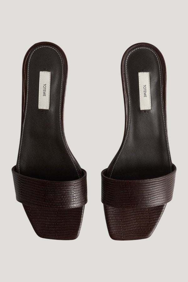 Slim lizard-embossed bandeau mules — model side