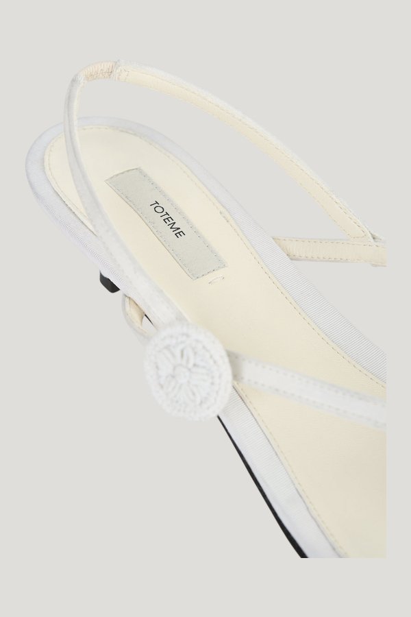 Slingback satin flip flops — model side