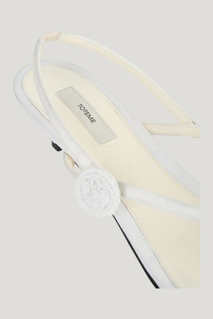 Slingback satin flip flops — model side