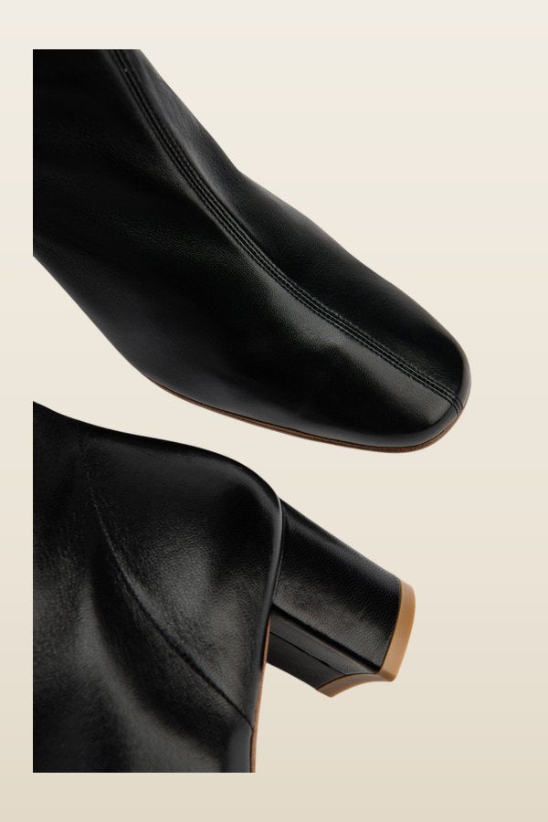 Sofia Black Leather Ankle Boot — model back