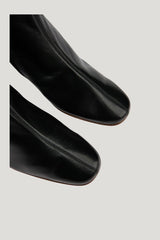 Sofia Black Leather Ankle Boot — model side