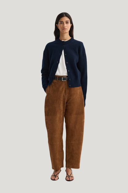 Sculptural suede trousers — model front